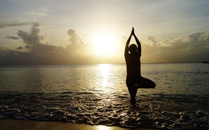 Full Throttle Flow — yoga inside a private jet hangar, a Luxe Alliances brand activation